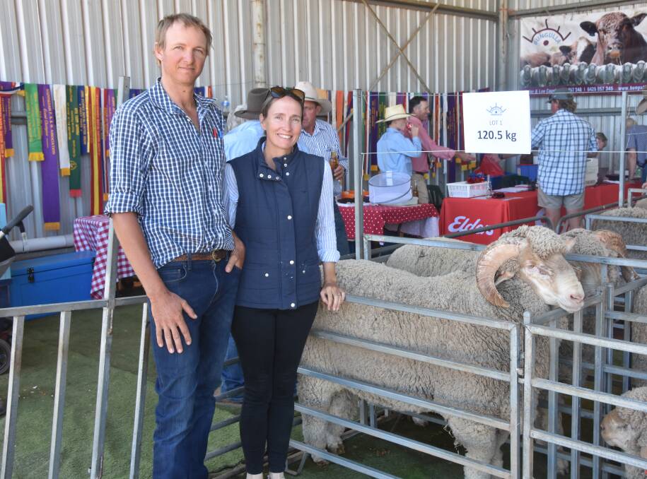 Alistair and Stacey Marshall with their purchase of the heaviest two tooth merino ram Bungulla have offered in over 21 years, weighing in at 120.5 kilograms.