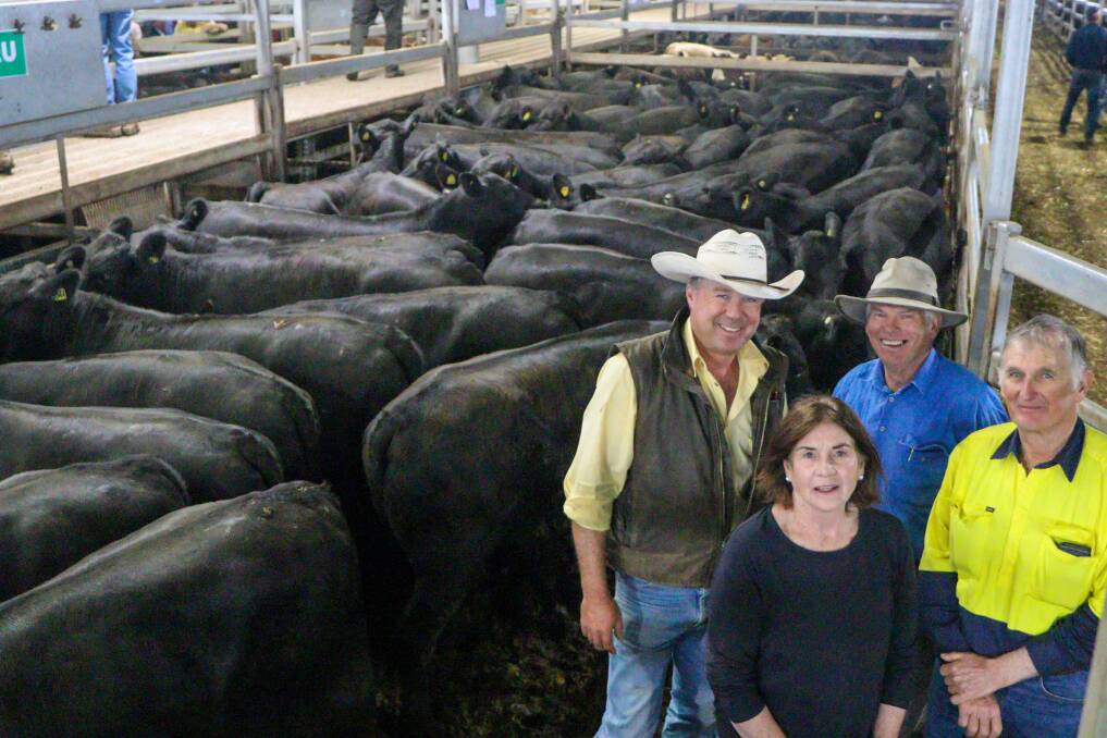 Ben Emms, Ray White Emms Mooney, Rhonda and Graham Gordon, and Garry Telford, Glendower, with the top priced pen of steers. 