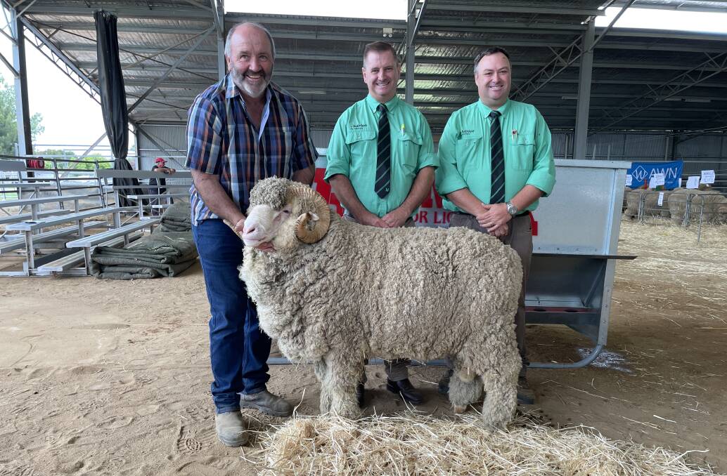 Peter Lette, Conrayn Merino stud, Berridale with the $16,000 top-priced ram at the Armidale multi-vendor sale. With him representing the buyers, Brett and Michael McDonald, Williamsdale, Canberra, are Nutrien Ag Solutions' Rick Power, Grenfell and Brad Wilson, Dubbo.