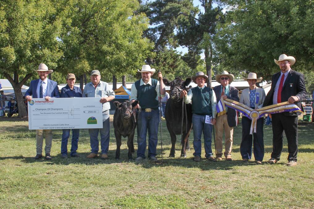 Sponsor Shannon Lawlor, IAH, exhibitors Annette Barham and Murray Sowter, handlers Col Fallis, Canada, and Jamie Hollis, Pittsworth, Qld, judges Steve Crowley, Barraba, Hannah Powe, Cargo, and Tim Lord, Kangaloon, with the champion of champions winner. Picture by Alexandra Bernard