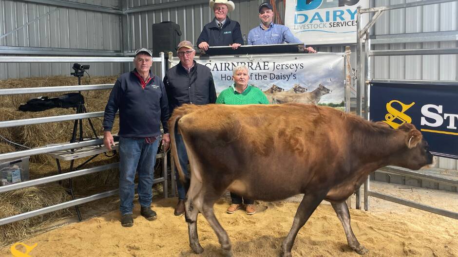 Alan Carson, Brian Leslie and Janine Carson at Cairnbrae Jersey's final dispersal sale, Paraparap. Picture supplied