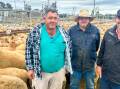 Vendor Anthony Stonestreet, Farview, Narromine, with Elders Dubbo agents Mark Burrow and Martin Simmons. Mr Stonestreet sold 140, 36 kilogram, lambs for $300 a head at Dubbo on Monday. Picture by Elka Devney.