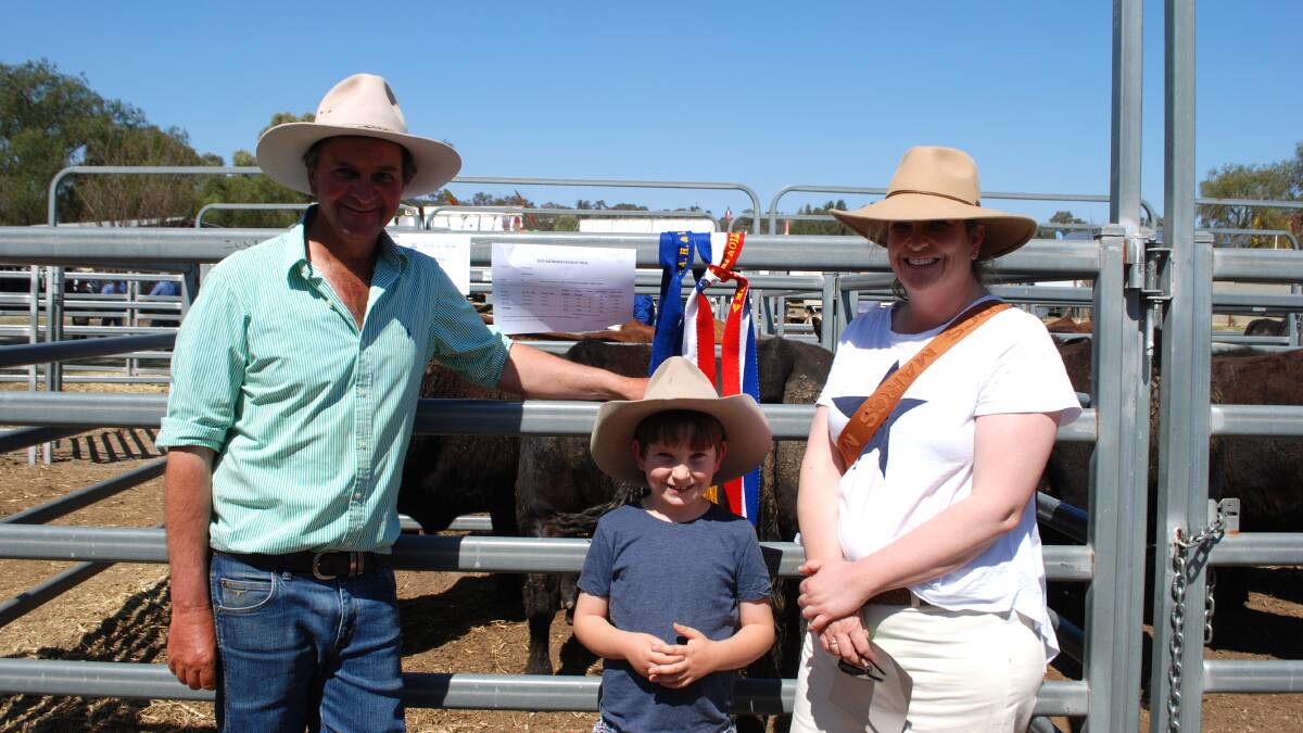 Stephen, George, 7, and Anna Gill, Hardwyck, Merriwa, with their champion pen of Limousin/Angus steers. 