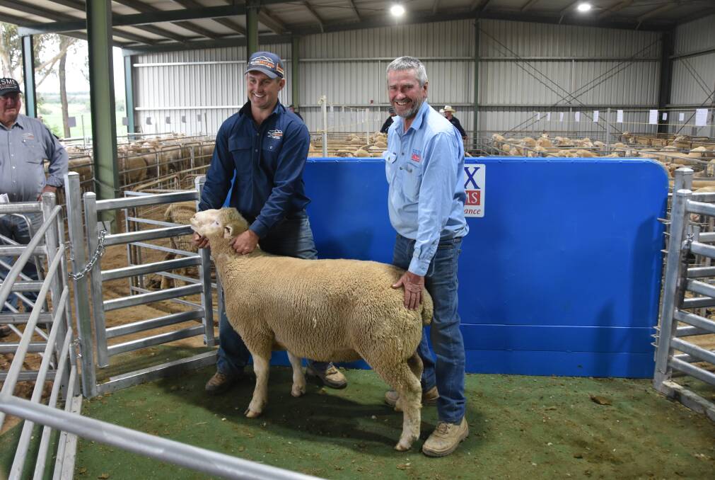 Top-priced ram for the sale sold for $10,600 to an undisclosed bidder on AuctionsPlus, Bordertown, SA, with Allan Gray and Co agent, Rory Brien and Felix Rams stud prinicpal, Rodney Watt. Photo by Helen De Costa. 