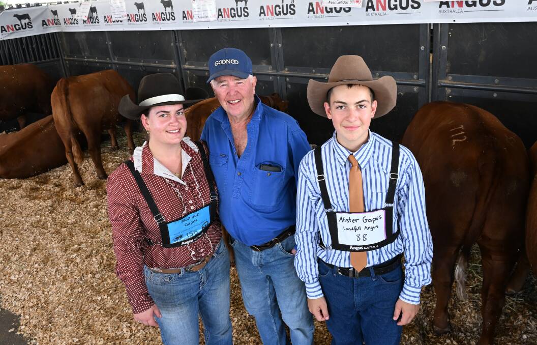 Monique Gapes, originally from Lismore, now in Wagga Wagga, with Tamworth farmer Graham Jordan, and Alister Gapes, Lismore. Picture by Gareth Gardner.