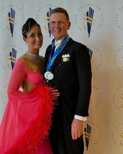 John Thomas and coach and dancing partner Jody Rollason took silver in the Australian Dance Sports ProAm Masters in Perth in June 2024 where they performed a waltz, quickstep, foxtrot and tango. Picture: Supplied