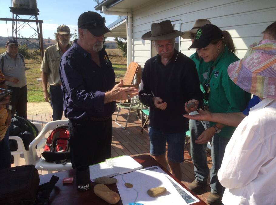 Graham Moore showing Aboriginal artefacts to the participants in the two-day workshop. Photo: Hovells Creek Landcare