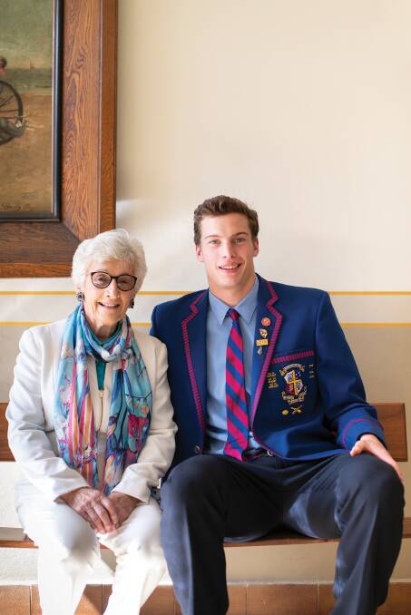 Toni Ridge with grandson Hugh, has a long family connection with St Joseph's College.