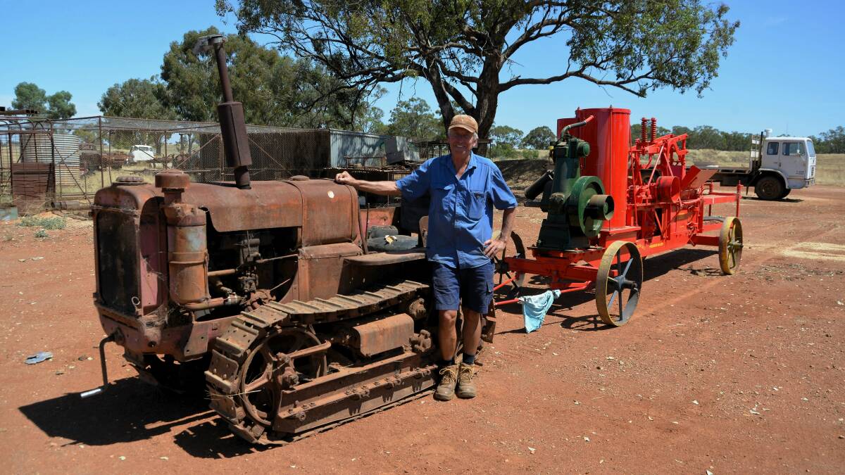 "Digger" Anderson with his 1937 McCormick and Deering T6 tracked tractor and the 1940 haypress bought by his grandfather John Fenton Anderson which featured in the SBS television series "While The Men Are Away". Picture by David Ellery