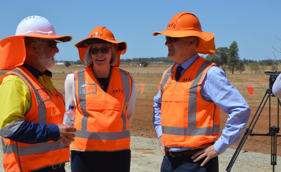 Parkes Mayor Ken Keith and Forbes Mayor Phyllis Miller chat to Deputy Prime Minister Michael McCormack about the Inland Rail project. NSW Farmers wants an inquiry into the project managers' decision-making processes. 