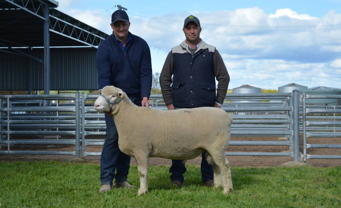 Springwaters principal, Dane Rowley, Boorowa, and buyer Richard Maas, Lake Bathurst, with his $17,000 sale-topping purchase, Springwaters 748/21.