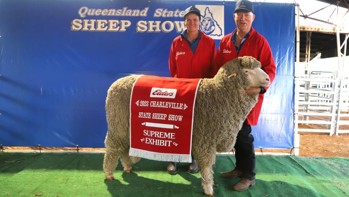 Danni and Kevin Crook, Merino and poll Merino Stud, Ouyen, Victoria holding the supreme exhibit of the 2023 Queensland State Sheep Show. Picture: Sally Gall