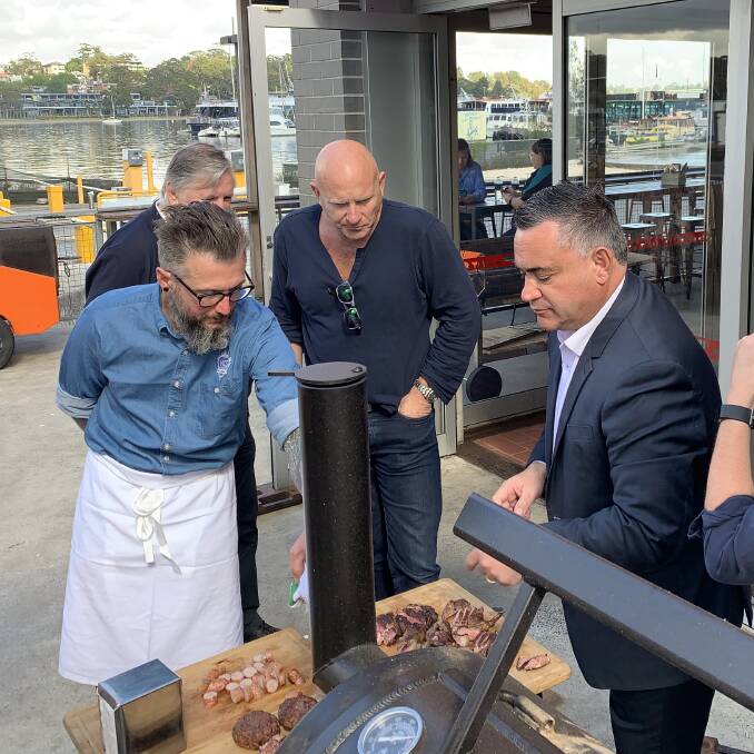 Vics Meats education and butcher Darren O'Rourke, celebrity chef Matt Moran and Deputy Premier John Barilaro.

