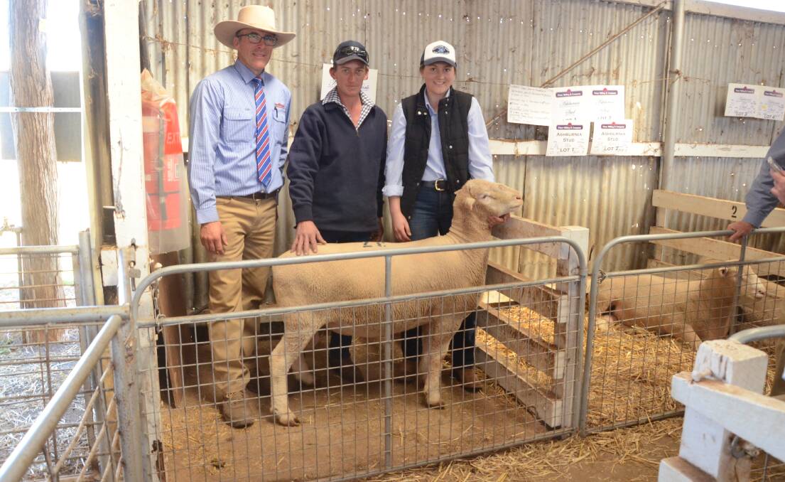 The $3700 top-priced Kanoona Park stud ram with selling agent Danny Tink, Peter Milling and Company, Dubbo, buyer Dustin Rawlinson, Old Castle, Leadville, and Lauren Henry of Kanoona Park stud, Curban.