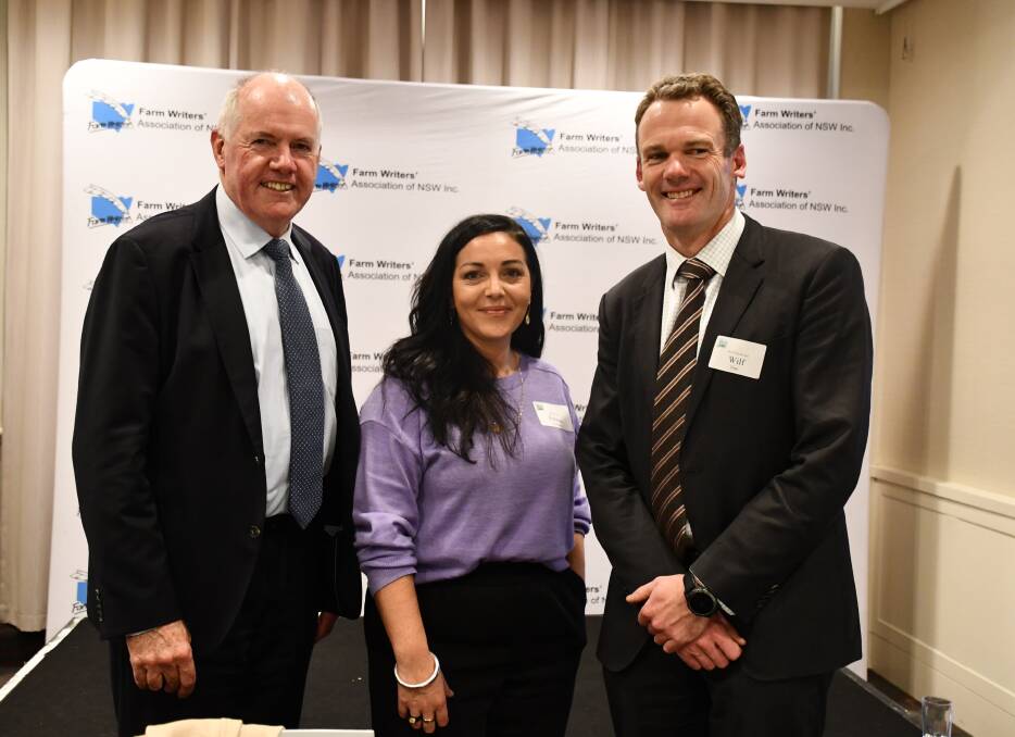 At the Farm Writers Association of NSW, ACCC deputy chair Mick Keogh and Victorian Farmers Federation president Emma Germano with Farm Writers vice president Wilfred Finn. Picture by Denis Howard.