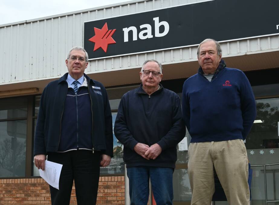 Disappointed in the NAB's decision to close it's Warren branch are Warren Shire Council general manager, Gary Woodman, Warren Health Action Committee member Rod Sandell, and Egelabra Merinos' Malcolm Kater. 