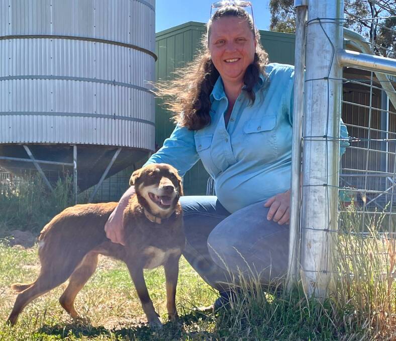 Kim Storey, Billa, Eugowra, with her dog Ruby, waiting to see if Eugowra will get a Resilient Homes Program similar to Lismore. Picture by Denis Howard