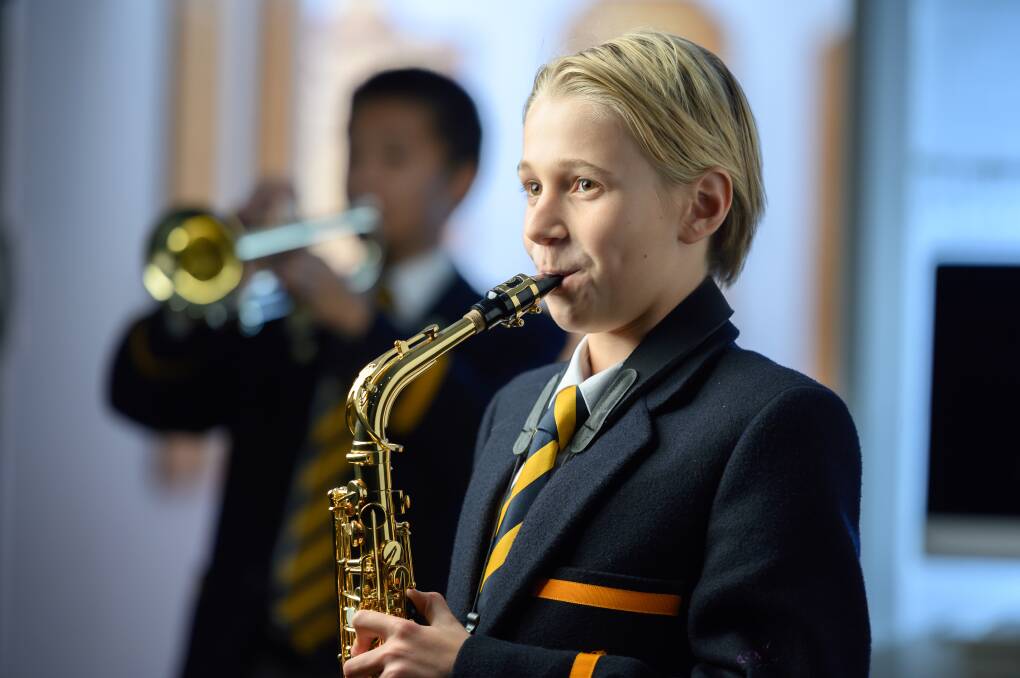 Year 8 Scots College student Leo Broadhurst playing the saxophone as part of one of the school ensembles. 