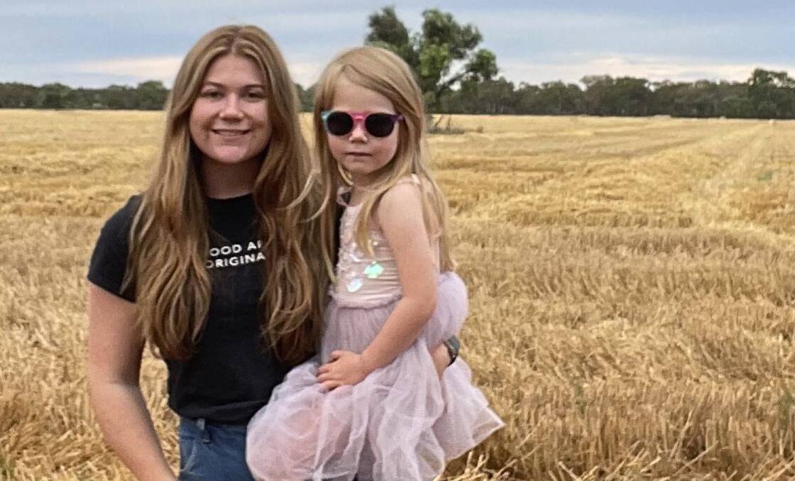 Keiley Noble with daughter Ruby during a past harvest. Picture supplied