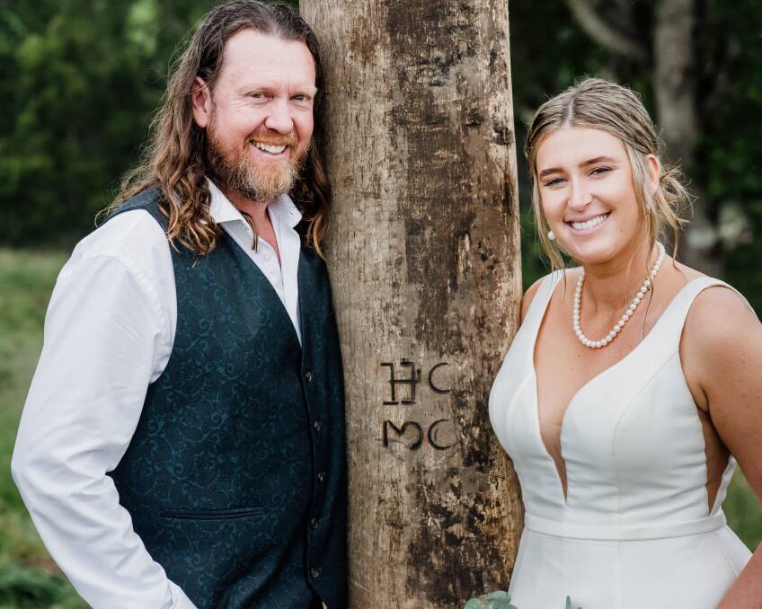 Heath and Madeline Cook after etching their initals in the arbour. Picture by Lou Walpole - Dorrigo Photographic Services
