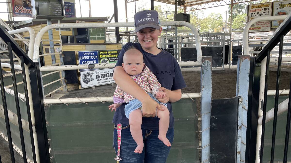 Jojo Watters, Calliope, brought her daughter Pip to the Grafton saleyards for the first time on Thursday to witness the lift in the market.