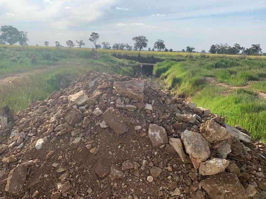 An outlet of the Mulwala Canal was blocked by dirt and rocks in what Murray Irrigation and MDBA are calling an act of vandalism. Photo supplied. 