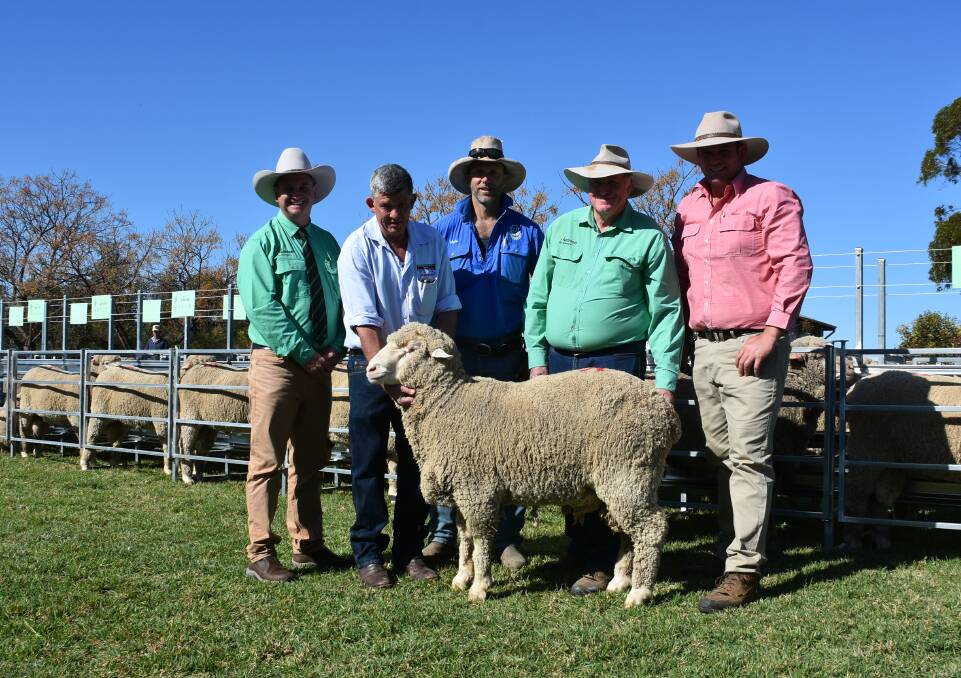 Rick Power, Nutrien stud stock, Mat Lacey, B N Proud & Co, Griffith, Ballatherie Poll Merino Principal Mark Peters, Stephen Chalmers, Nutrien and Rod Evans, Elders Griffith, with top-priced ram.