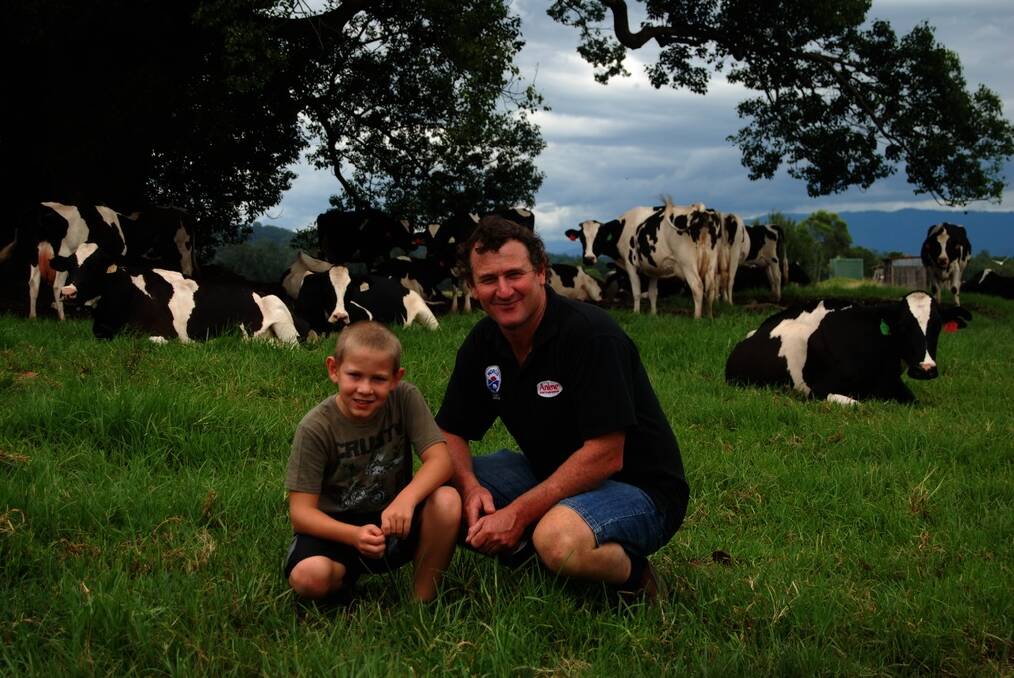 Bellingen milk producer Mark Perry and son Josh with their A2 Holstein herd.