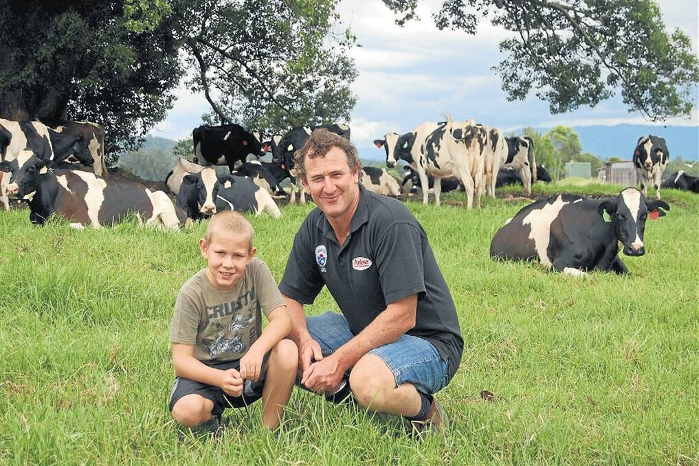 Mark Perry and son Josh and some of the family’s A2 Holstein herd.