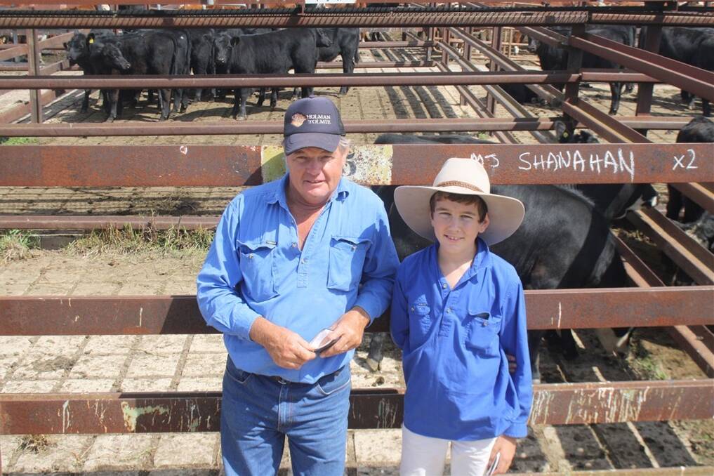 Ronald Ward, “Bellevue”, Cootamundra, pictured at a recent Goulburn weaner sale with his son Harry.