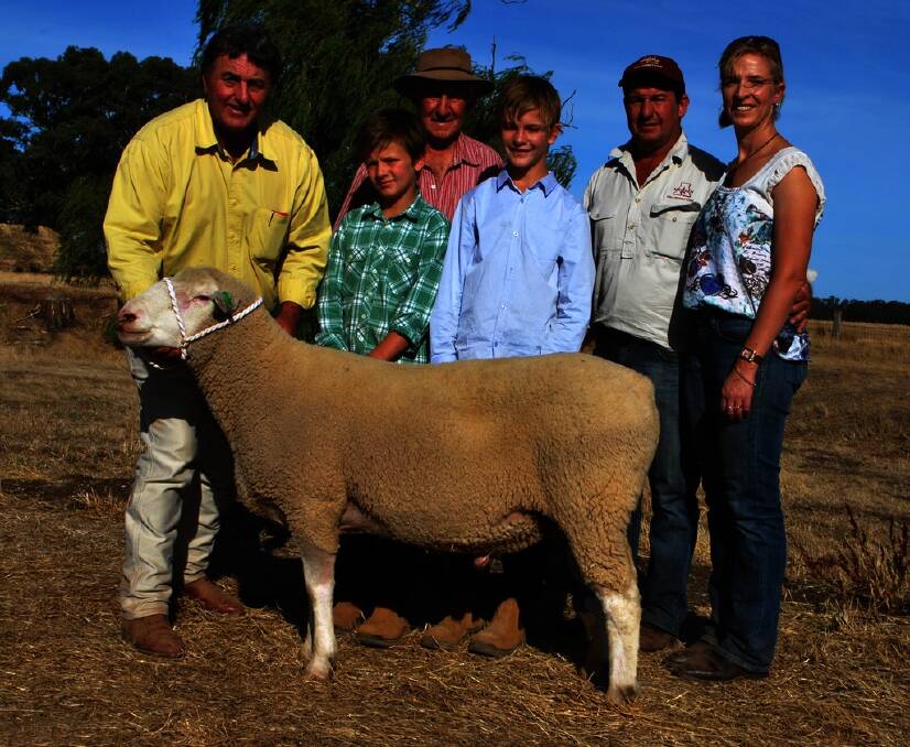 The sale-topping $21,000 White Caviar is held by Gloroy co-principal Colin Harris and members of the purchasing family, Samuel, Neville, Jonathan, Simon and Melissa Male, all of Aberdeen Poll Dorsets, Henty.