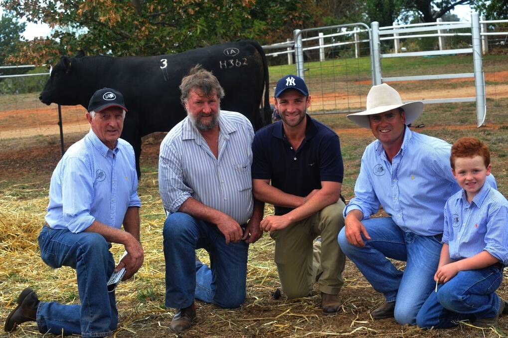 Willie Milne (left) and Corey and Charlie Ireland (right), Irelands Angus, Wagga Wagga, with top-priced bull buyers Greg and Phillip Hughes, Four O Eight Angus, Macksville. The Hugheses paid $10,500 at last week’s Irelands Angus bull sale.