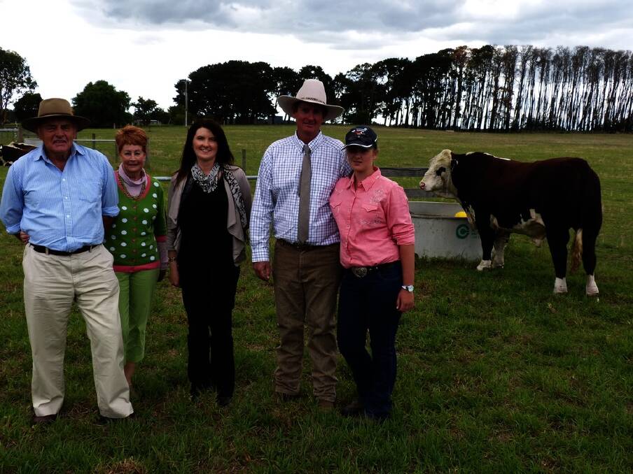 Peter and Leonie Adams, Staghorn Flat, near Wodonga, purchased the sale-topping $11,000 Mawarra Limited Edition AI (P) and are pictured with stud principals Peter and Deanne Sykes and their daughter Taylah, Longford, Vic.