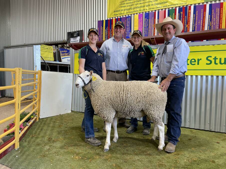The top priced stud ram at the Wattle Farm Border Leicester Production Sale with stud principal Jeff Sutton flanked by his daughters Elizabeth and Christine Sutton, and Jason Harton of Hartin Schute Bell. Picture by Karen Bailey.