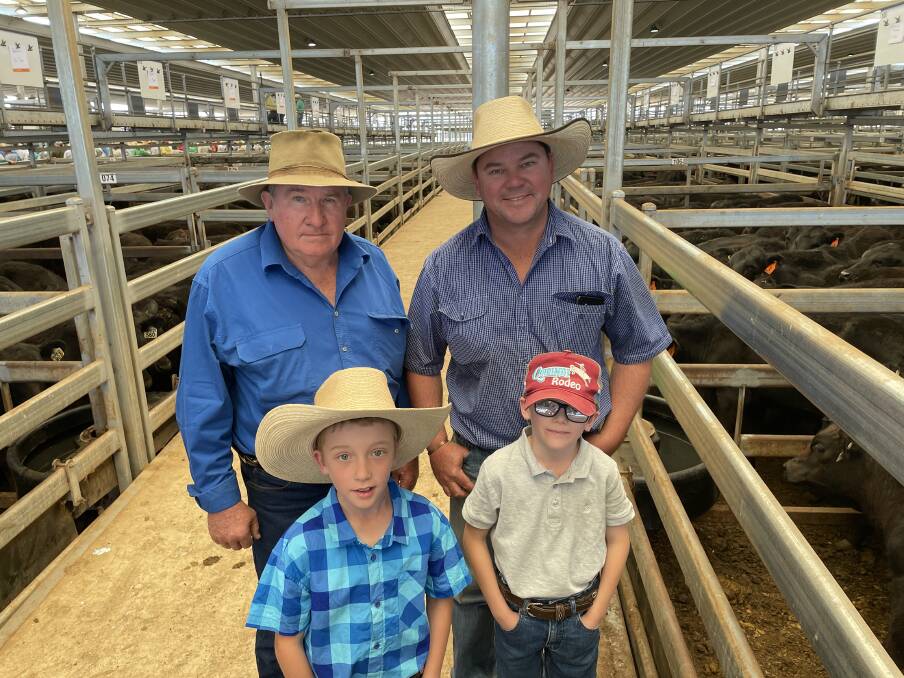 Charlie Pike, Rose Hill, Werris Creek, his son Craig and grandsons, Tom and Archie, were enjoying a day at the Tamworth store sale last Friday. Picture by Simon Chamberlain.